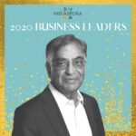 A man in suit and tie standing next to the words indiaspora 2 0 2 0 business leaders.