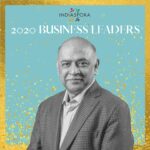 A man in suit and tie standing next to the words indiaspora 2 0 2 0 business leaders.