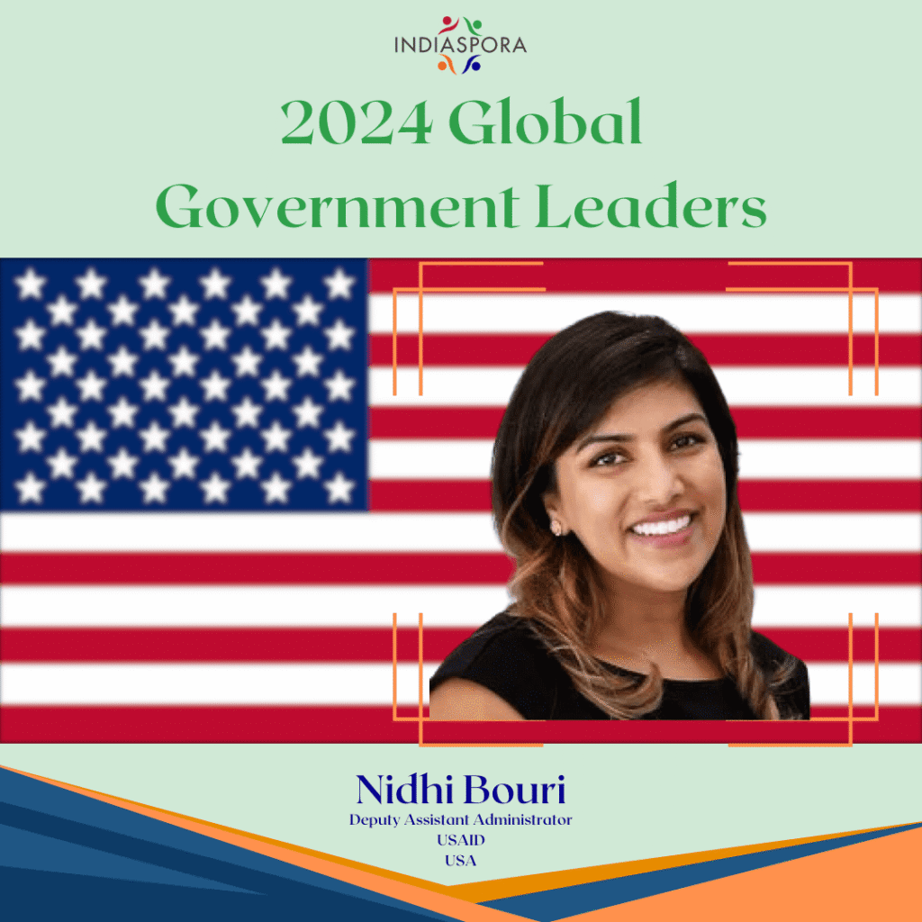 A picture of a person with the american flag in front.