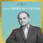 A man standing in front of the words indiaspora 2 0 2 0 business leaders.