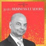 A man in suit and tie standing next to the words indiaspora 2 0 2 0 business leaders.