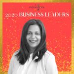 A woman standing in front of the words indiaspora 2 0 2 0 business leaders.
