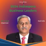 A man in suit and tie with the words 2 0 2 4 indiaspora business leaders