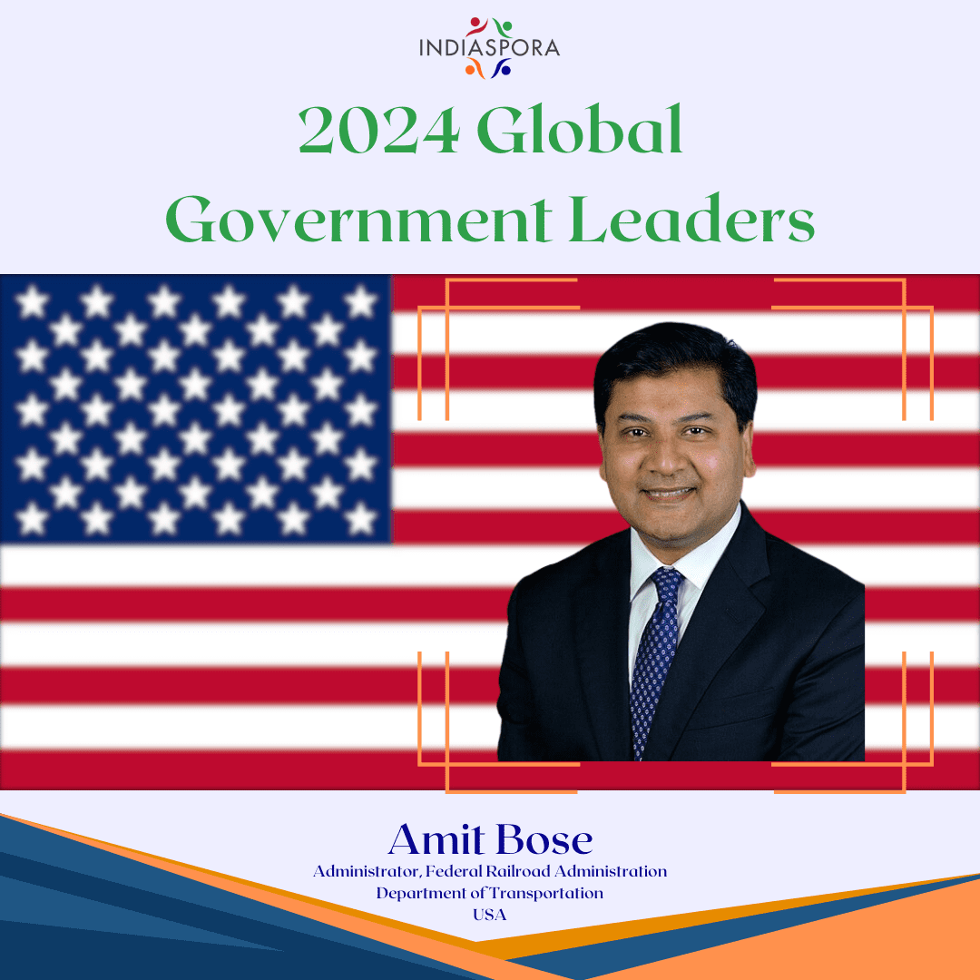 A man in front of an american flag.