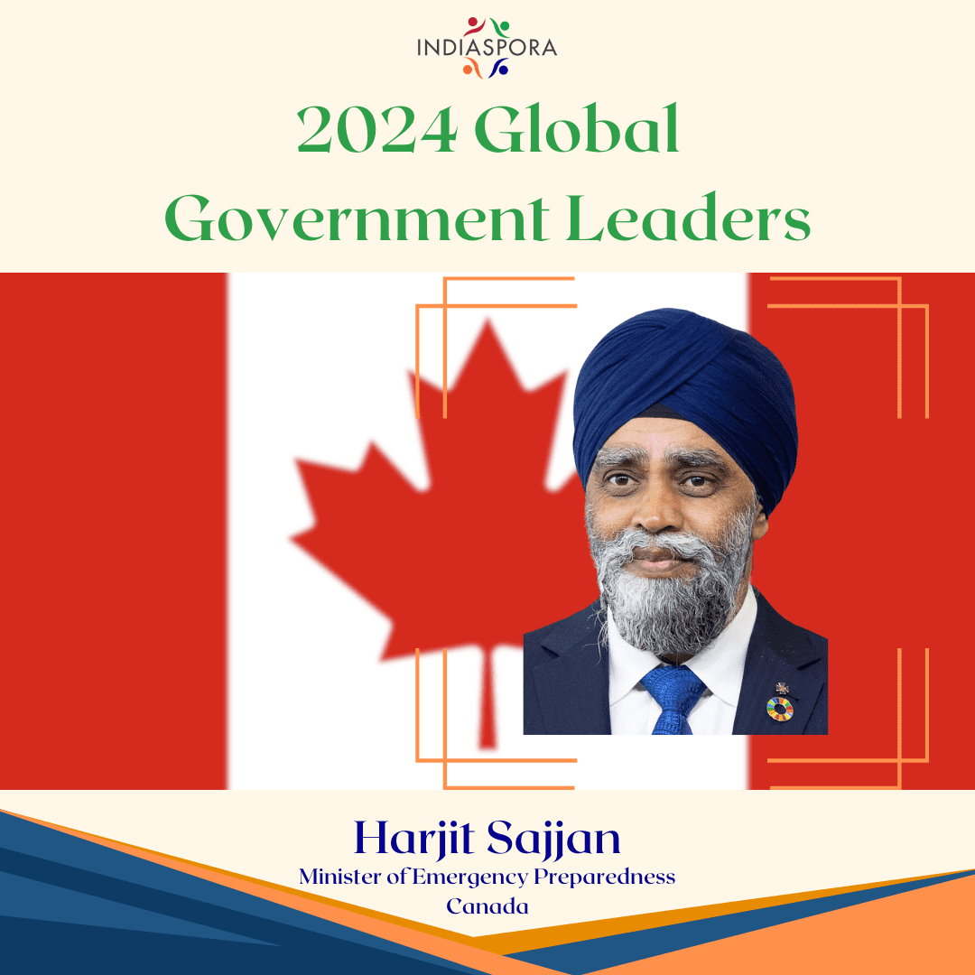 A picture of harjit sajjan with the canadian flag.