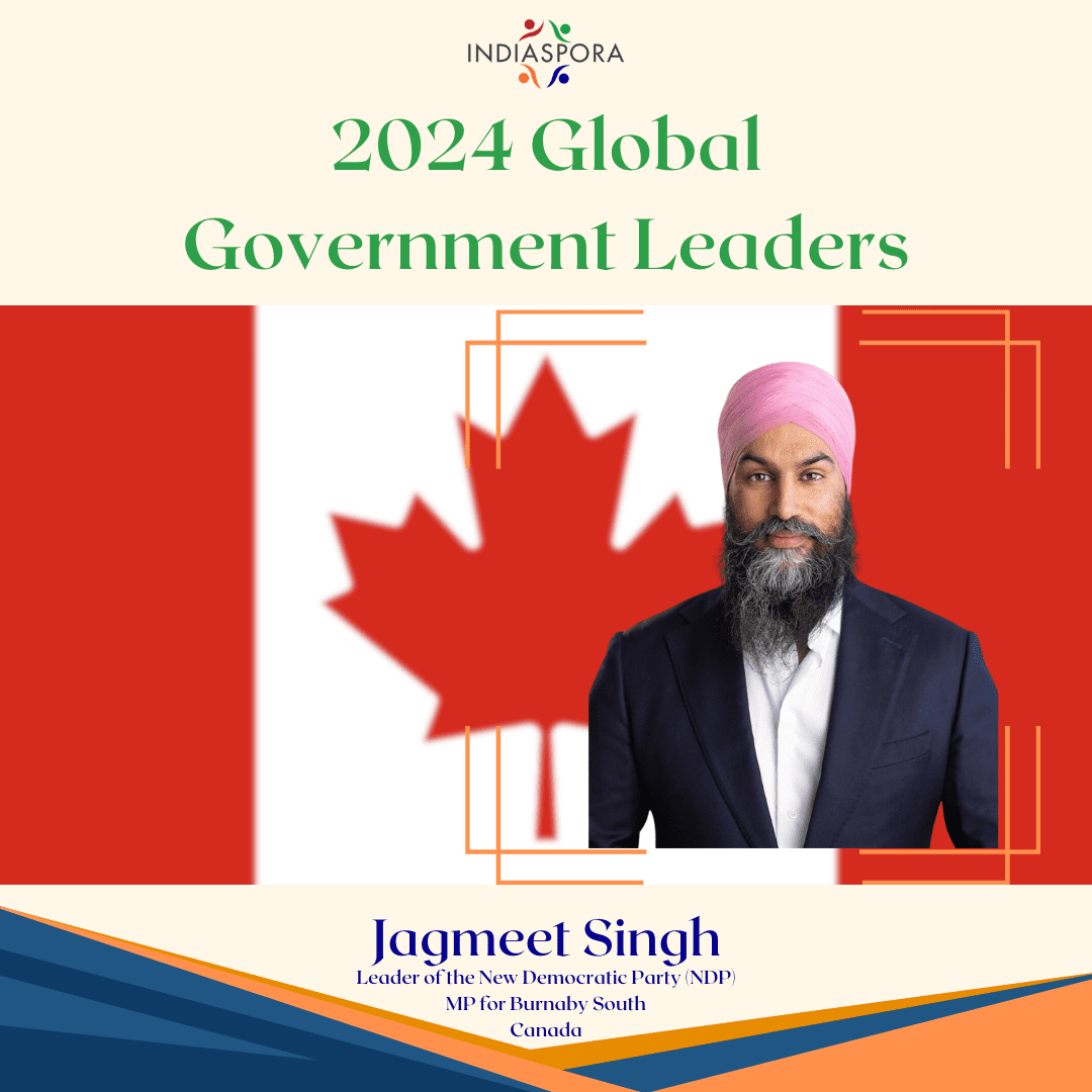 A picture of a person wearing a suit and pink turban.