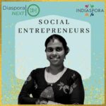 A woman standing in front of the words social entrepreneurs.