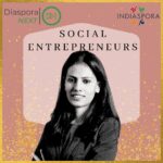 A woman standing in front of the words social entrepreneurs.