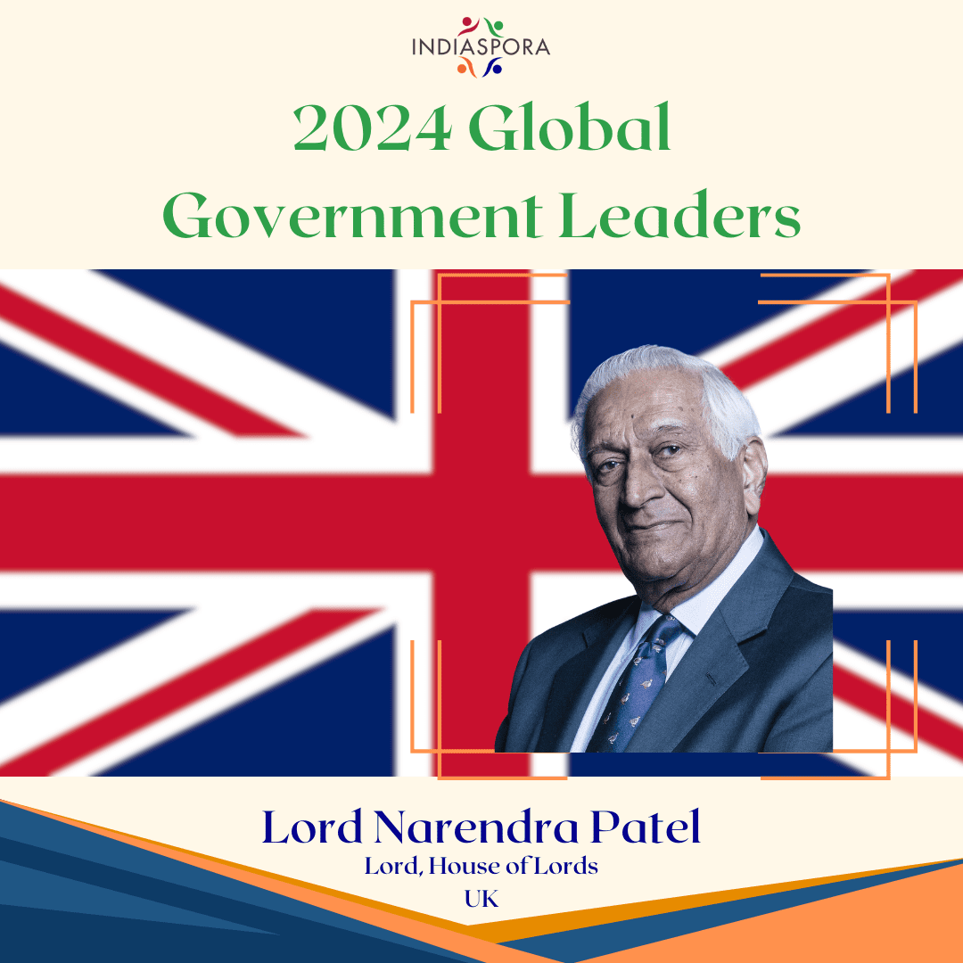 A picture of lord patel with the british flag behind him.