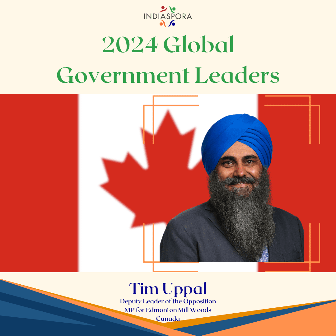 A picture of a person wearing a turban and smiling.