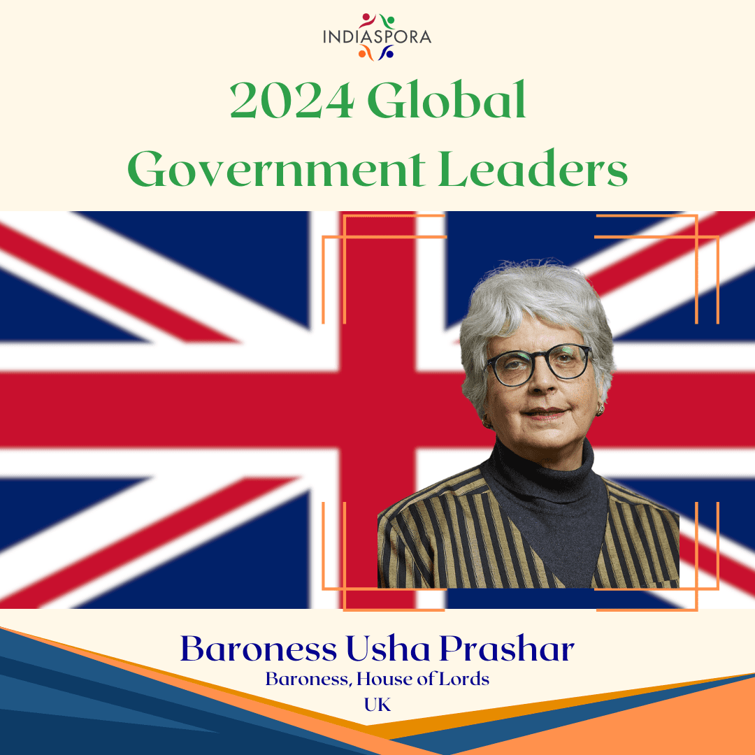 A picture of baroness usha prashar with the british flag behind her.
