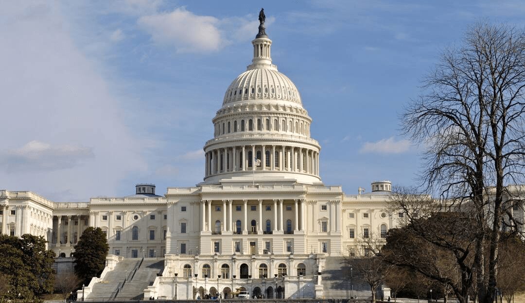 U.S. Capitol building under a clear sky.