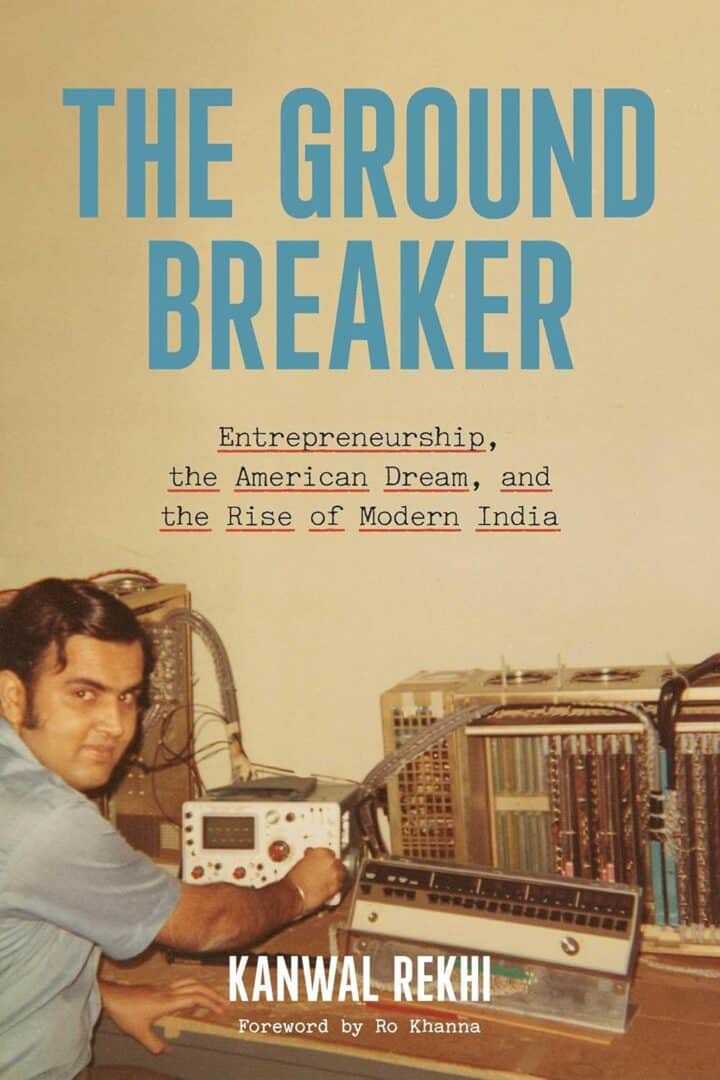 Book cover: The Ground Breaker, man at electronics|Older businessman in blue suit with city skyline|The Ground Breaker book cover, man with electronics