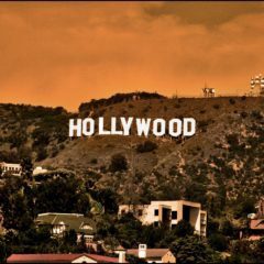 A picture of the hollywood sign taken from above.|A bar graph with the numbers 1 0 through 2 5.|A poster of some movies with the movie titles.