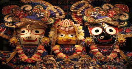 A close up of some colorful statues with faces