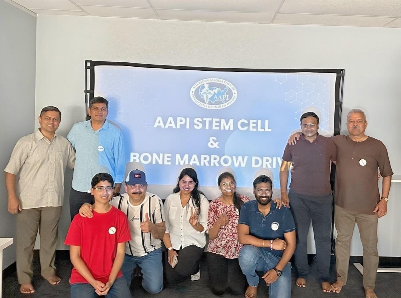 Group photo at AAPI Stem Cell Drive.|Man in tuxedo smiling at camera.|AAPI logo with map and medical symbol.|Three girls at a cell drive booth.|Two boys holding an envelope together.