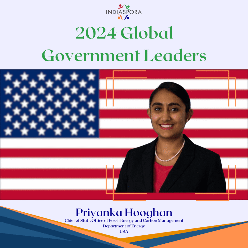 A picture of priyanka hooghan in front of an american flag.