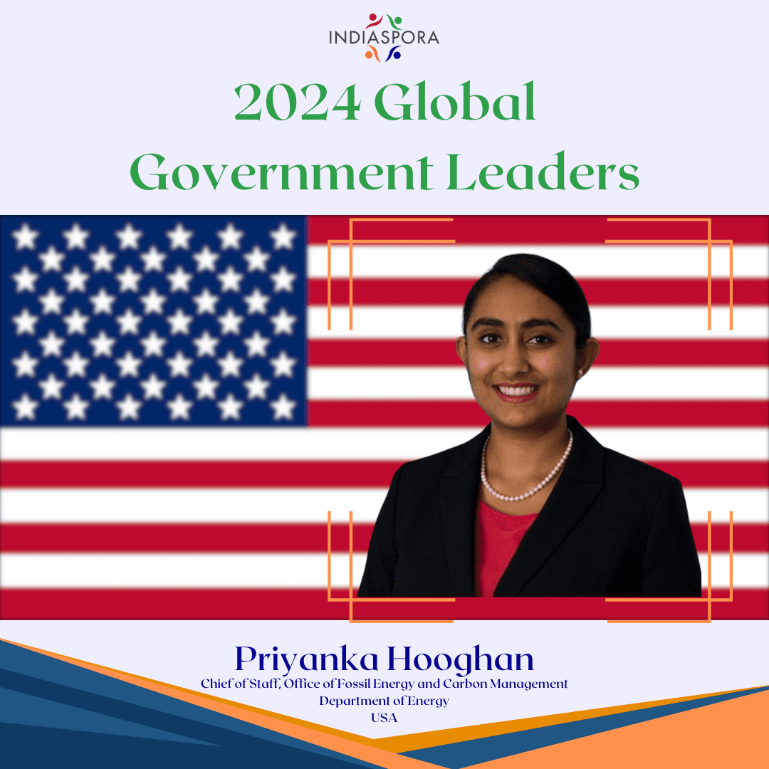 A picture of priyanka hooghan in front of an american flag.