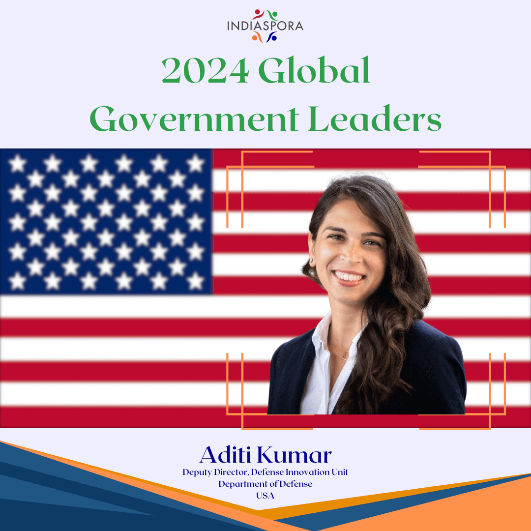 A woman in front of an american flag.