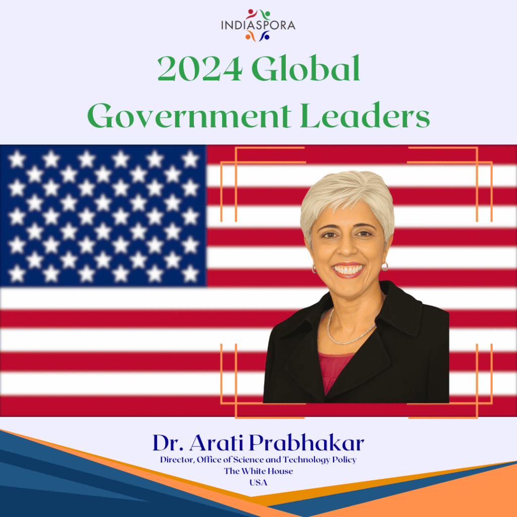 A picture of dr. Arati probhakar with the american flag in front of her face
