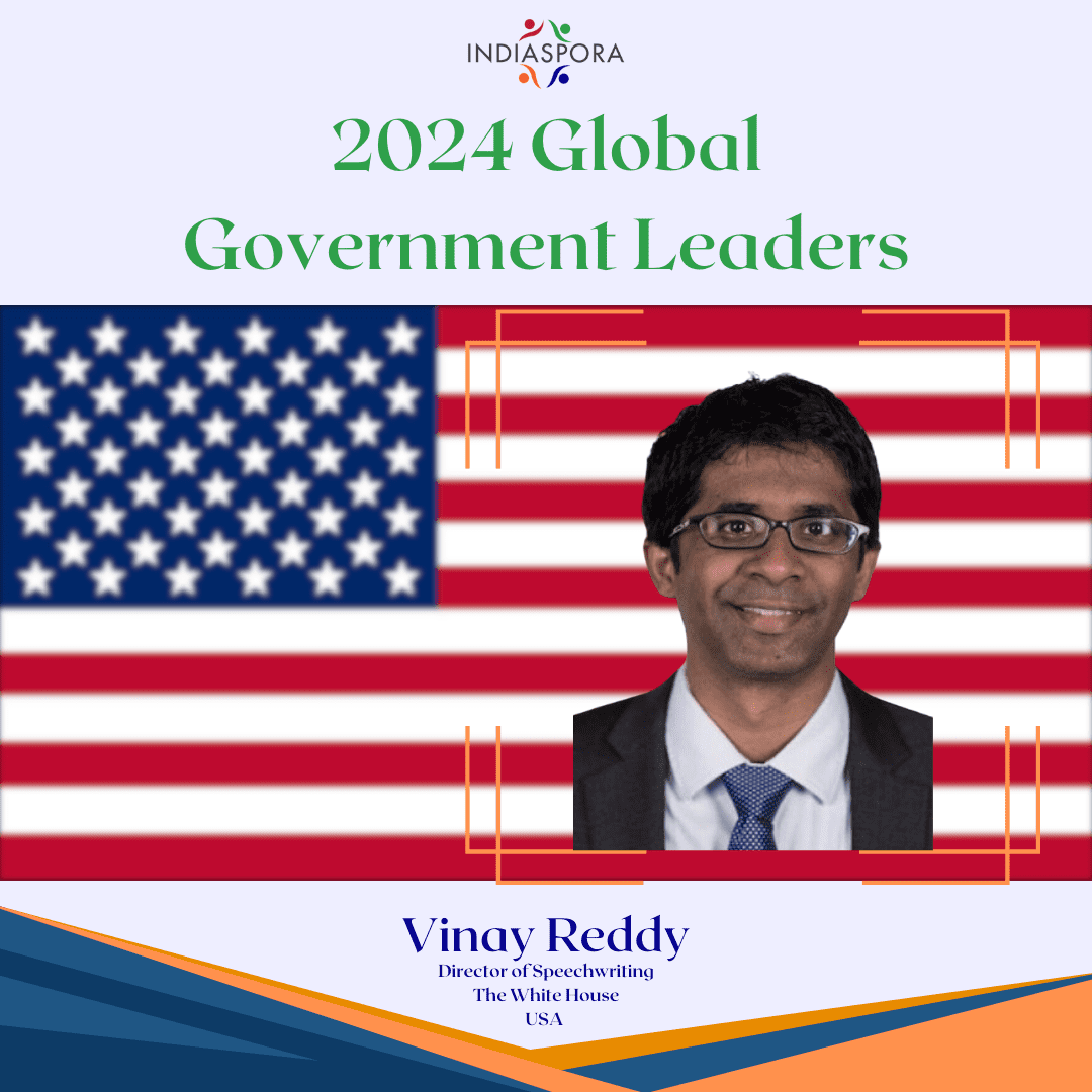 A man in glasses and an american flag.
