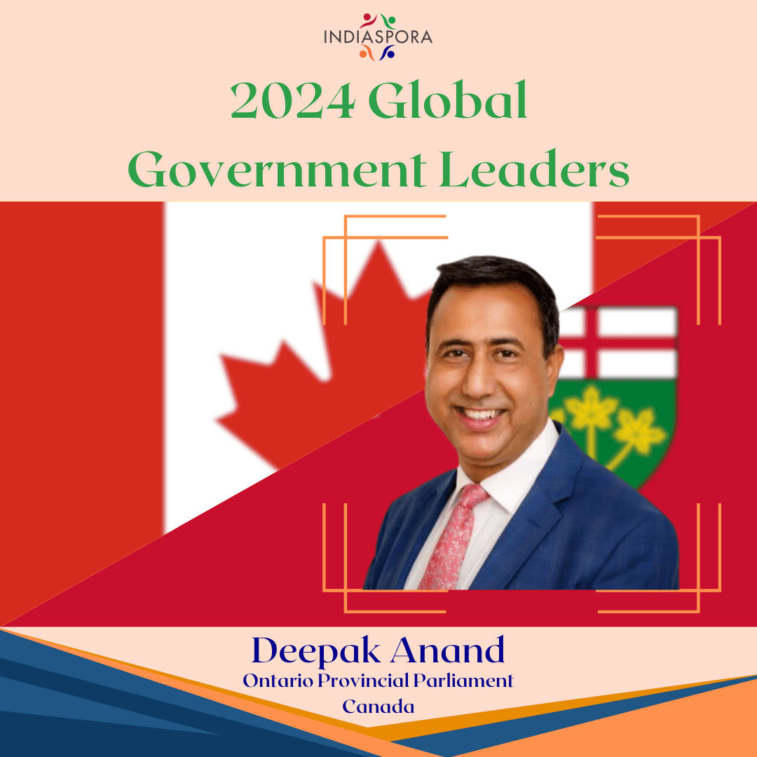 A picture of deepak anand with the canadian flag in front.