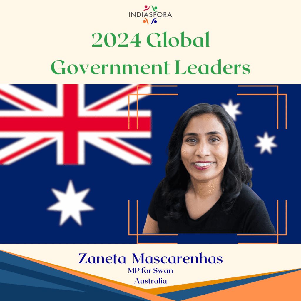 A picture of a person with the australian flag in the background.|A woman with long black hair wearing a black shirt.