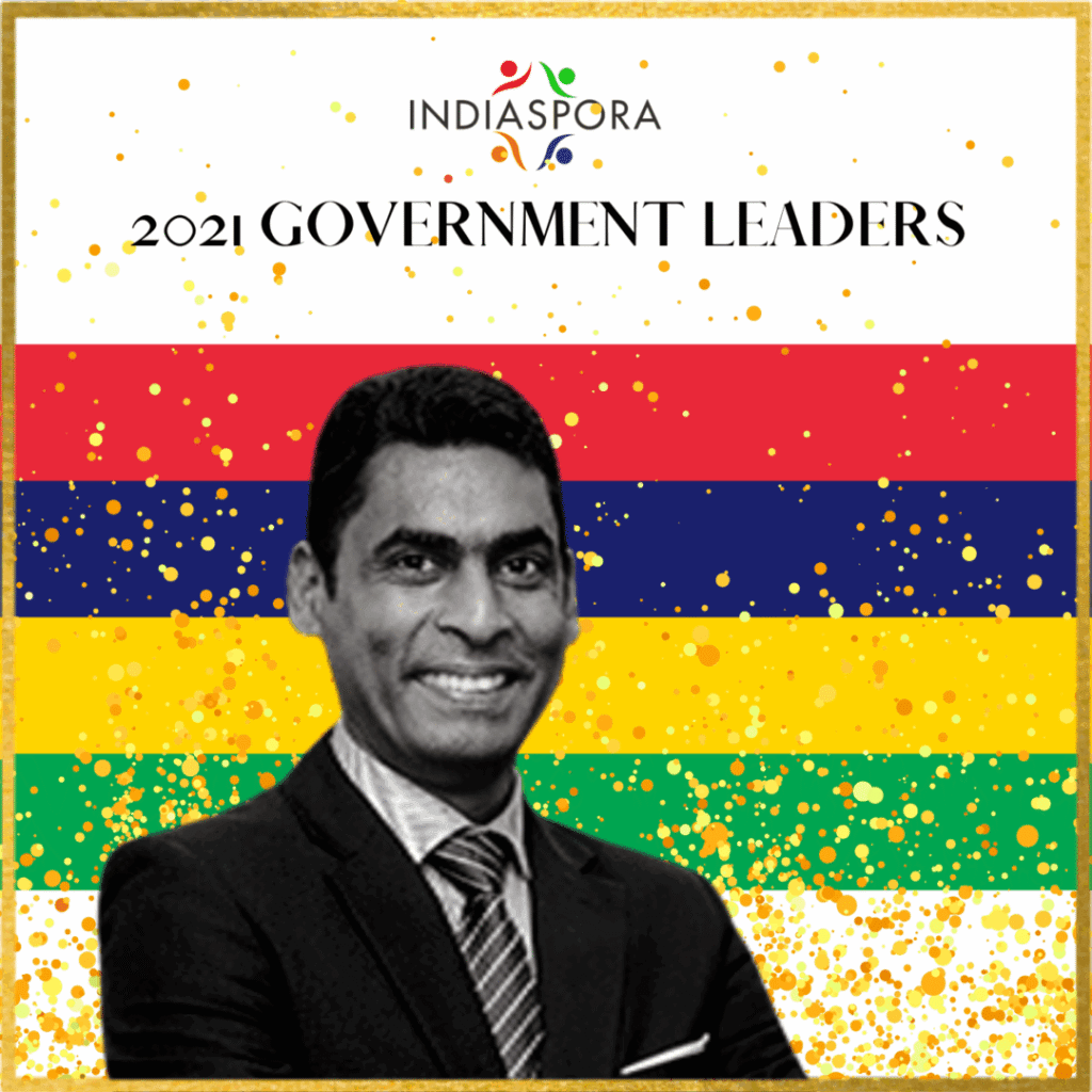 A man in suit and tie standing next to the words " government leaders ".