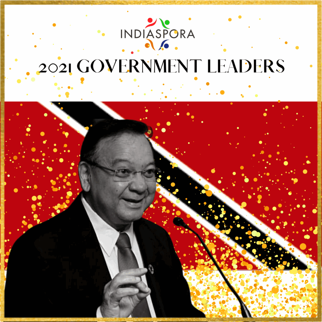 A man is speaking at an event with the words indiaspora 2 0 2 1 government leaders in front of him.