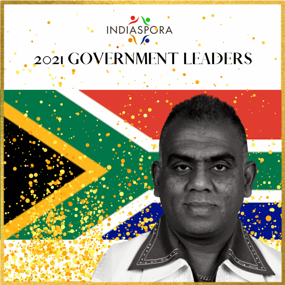 A man with a flag in the background.