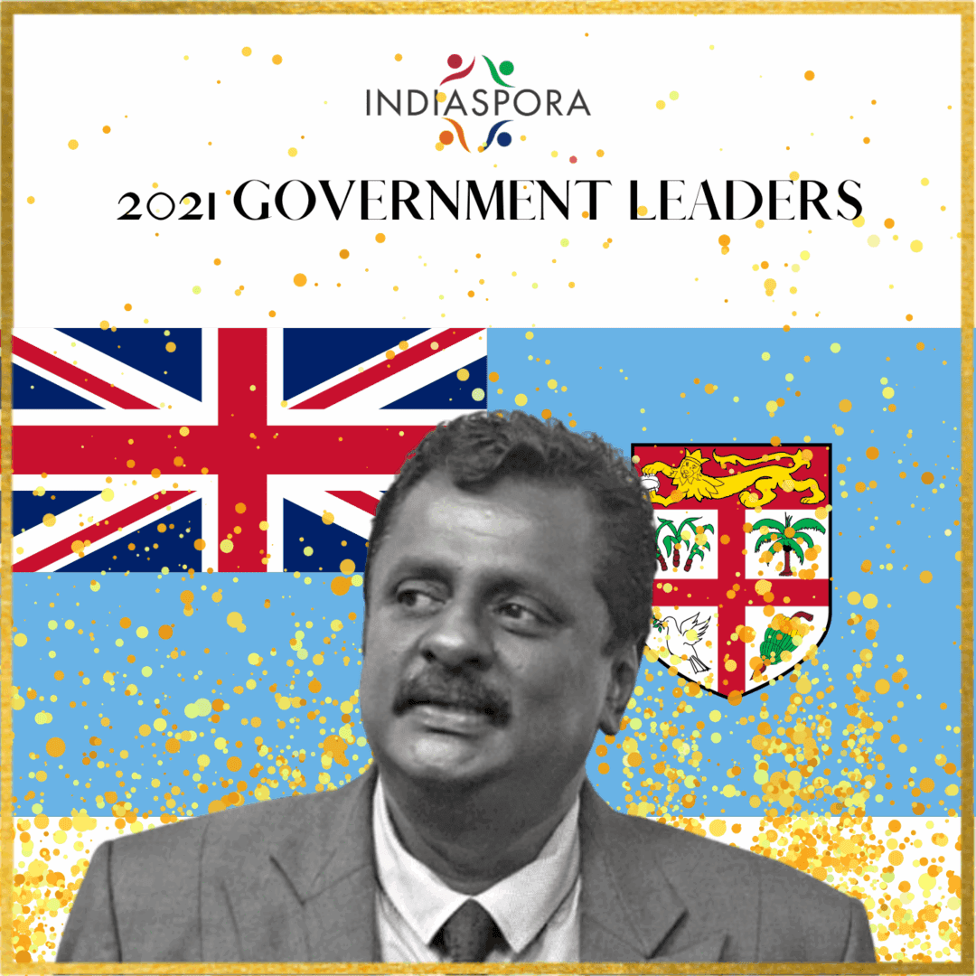 A man with a flag in the background.