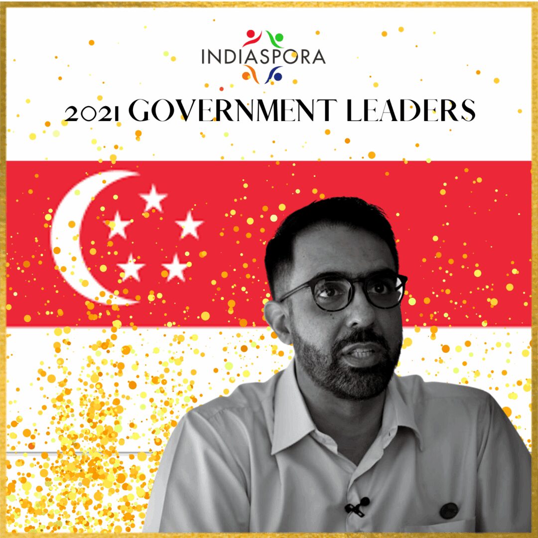 A man in glasses and a flag of singapore