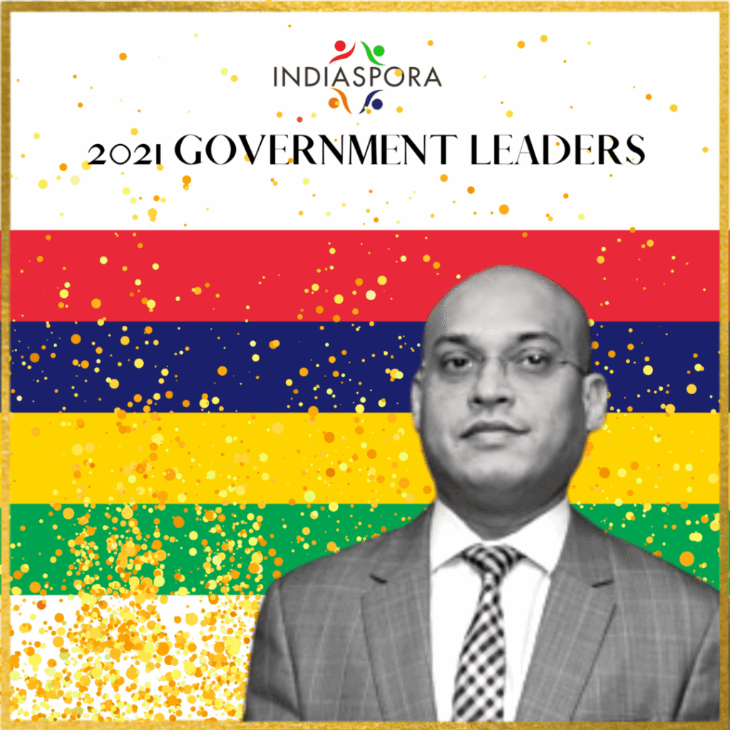 A man in a suit and tie standing next to the words " government leaders ".