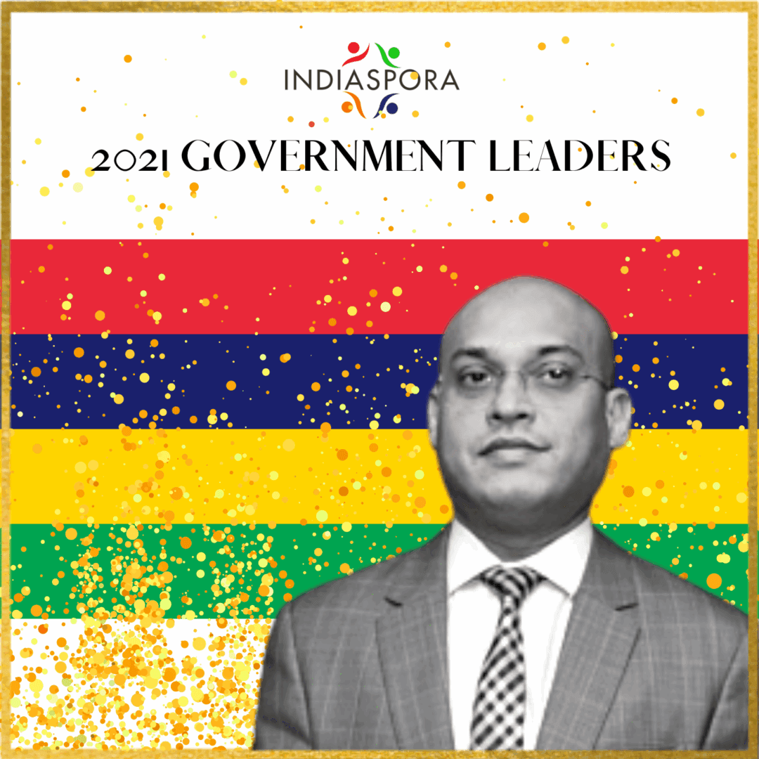 A man in a suit and tie standing next to the words " government leaders ".