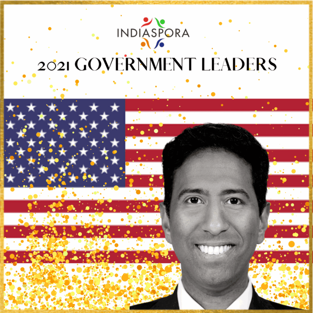 A man with a flag in the background