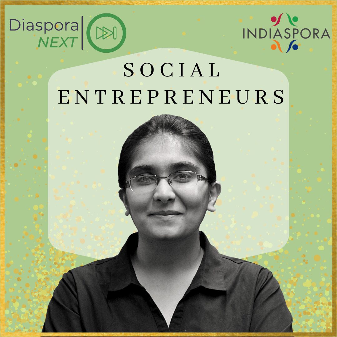 A woman is smiling for the camera with social entrepreneurs on it.