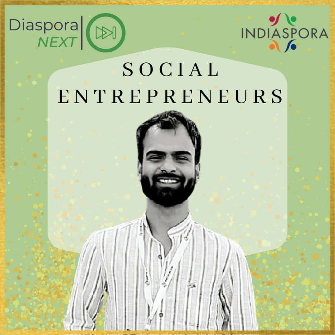 A man standing in front of the words social entrepreneurs.